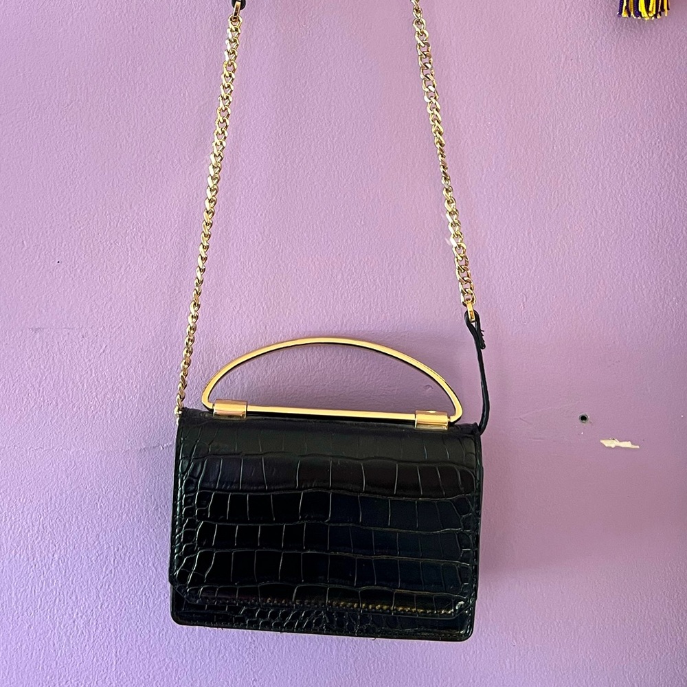 Mini clutch comes with strap